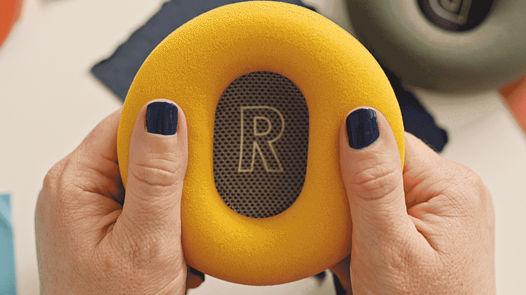 A Dyson OnTrac ear cushion is held by the foam cushions.