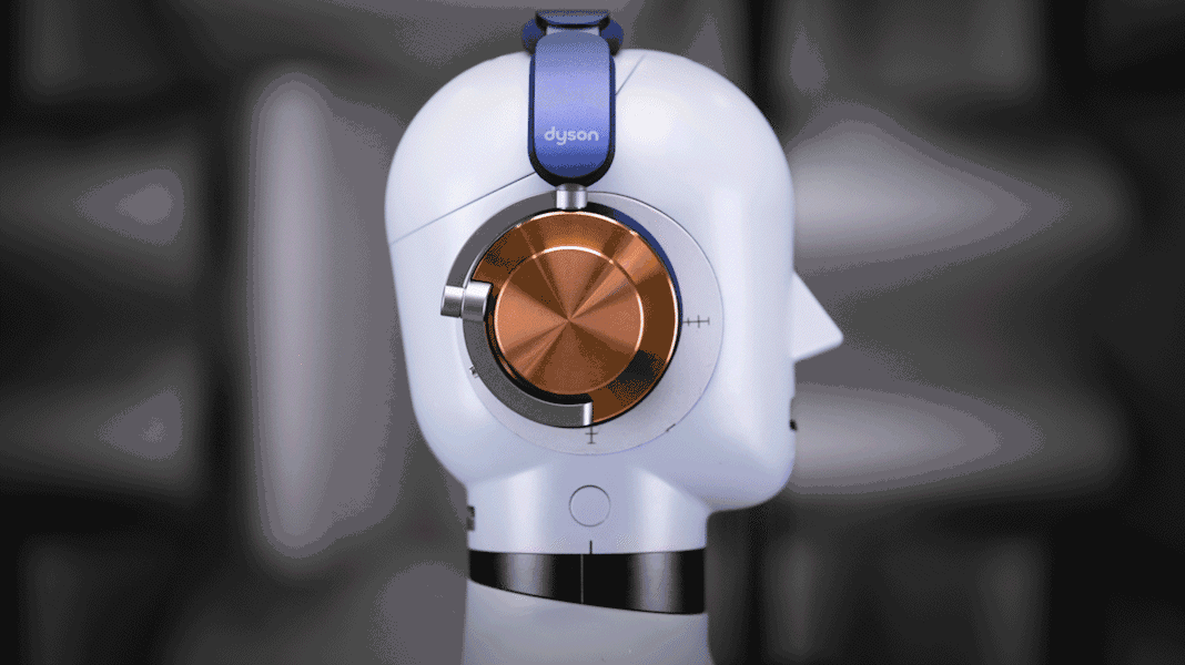 Dyson OnTrac headphones placed on the head of a mannequin.