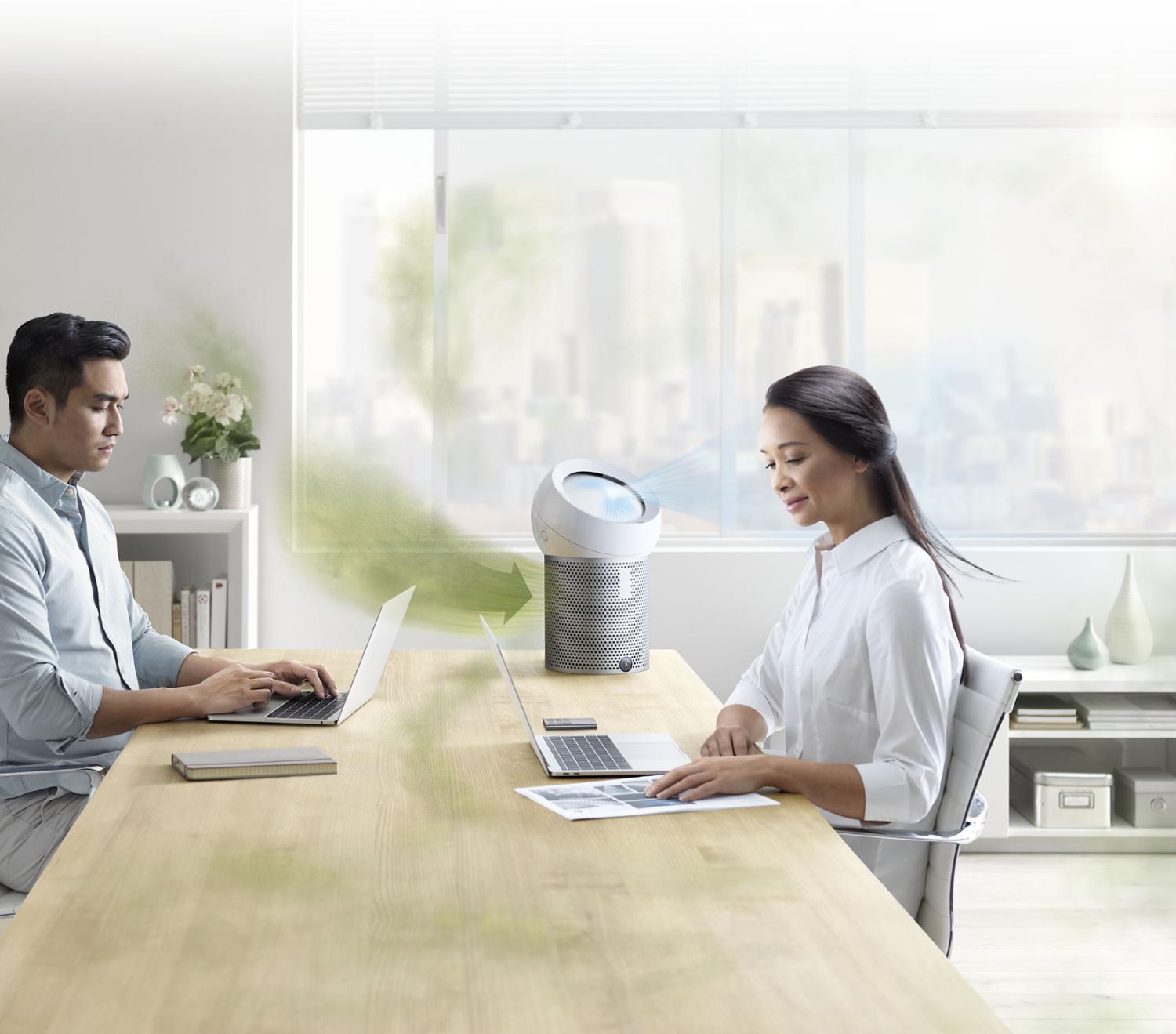 office workers with the pure cool me fan