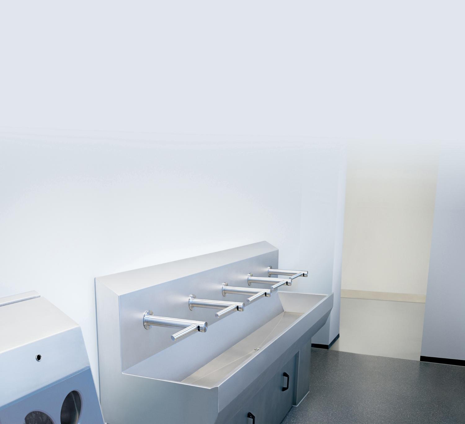 Rangée sèche-mains Airblade dans les toilettes