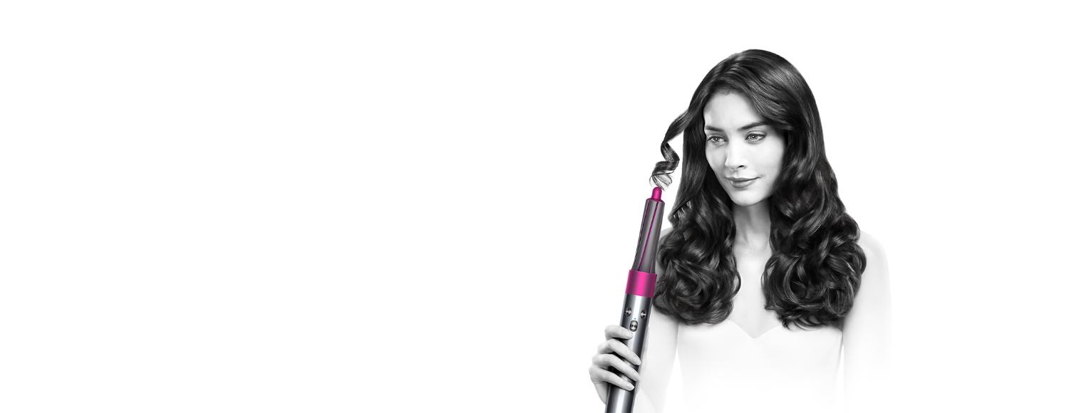 Dyson Airwrap being used by a model