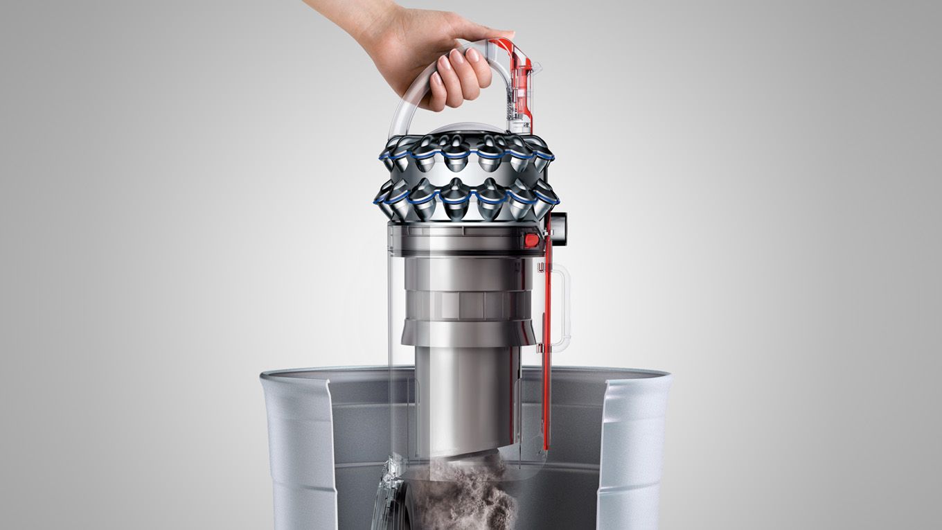 Dyson DC77 Bin being emptied Dyson DC77 Bin being emptied