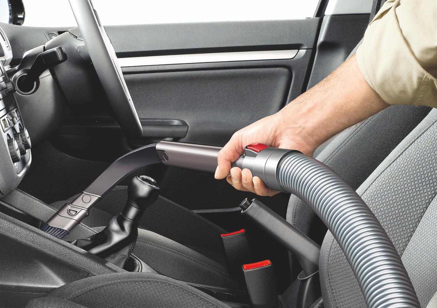 Flexi crevice tool being used in a car