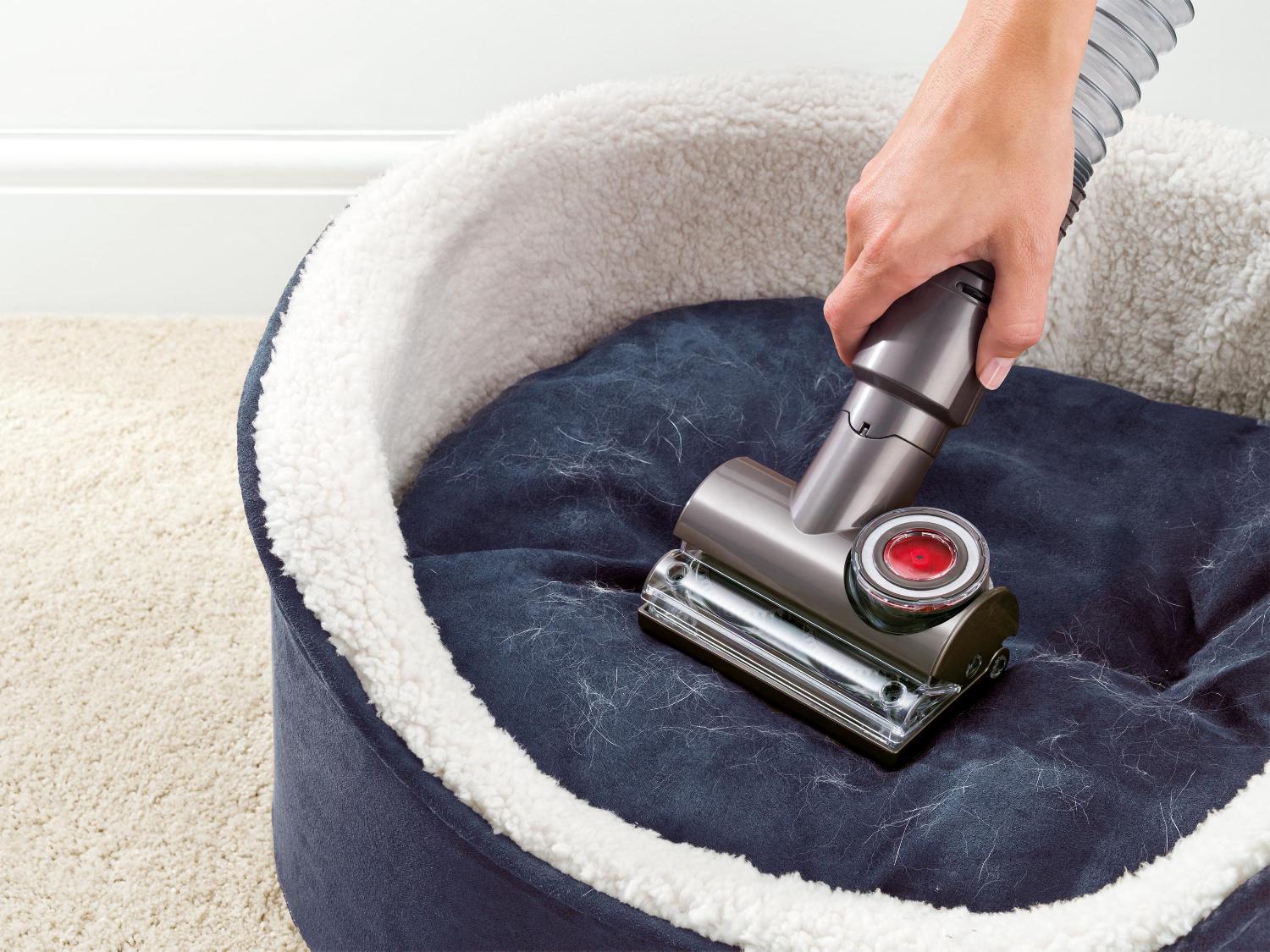 Mini soft dusting brush attached to a Dyson Cyclone V10
