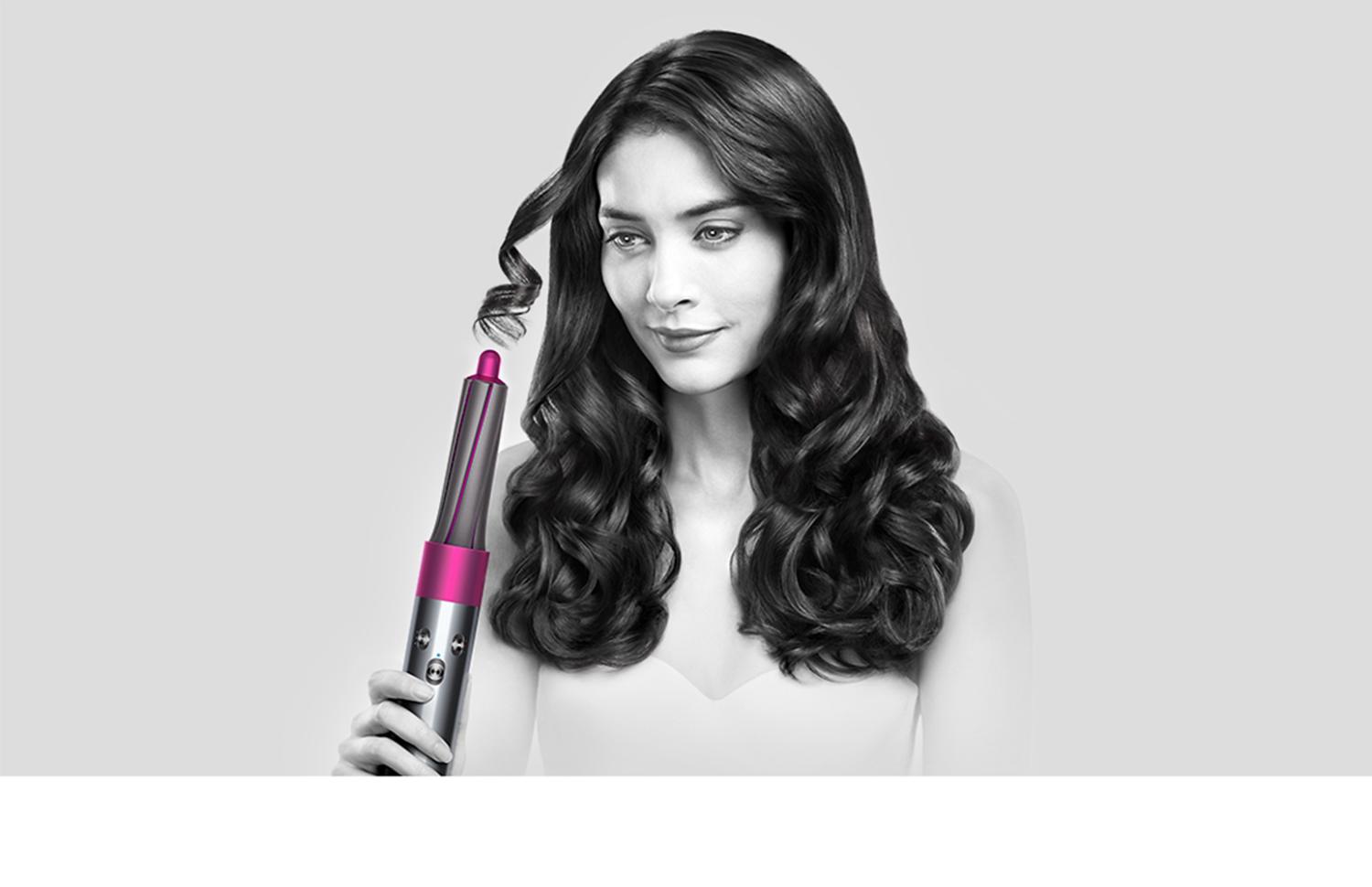 Model using Dyson Airwrap™ styler
