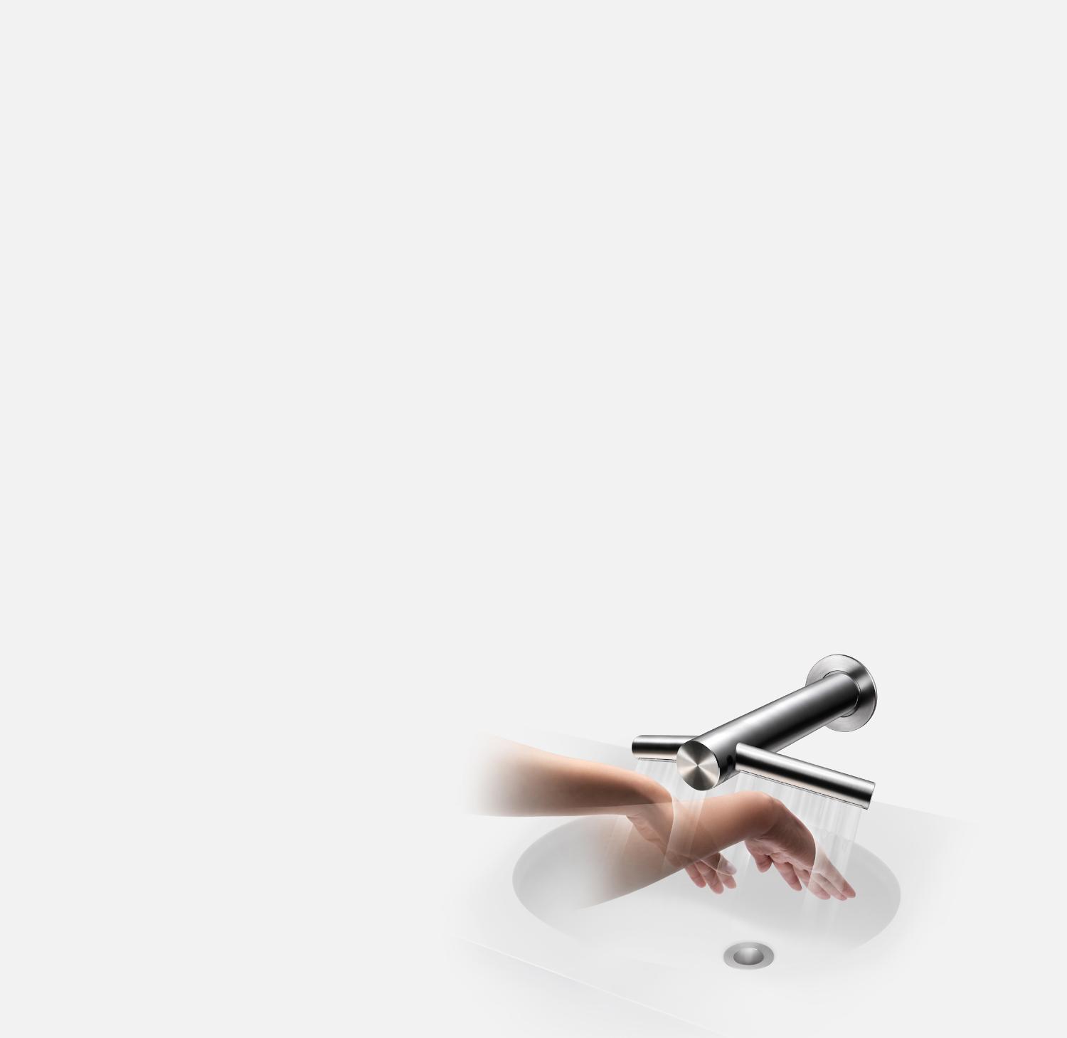 Hands beneath Dyson Airblade Wash+Dry hand dryer