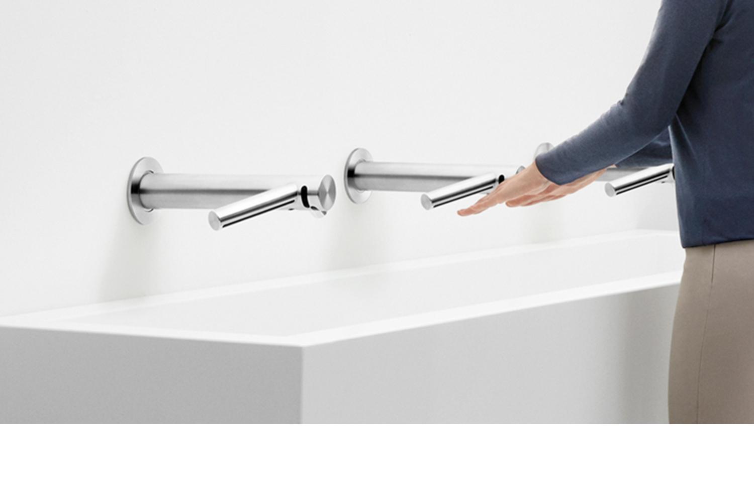 Woman using Dyson Airblade Wash and Dry