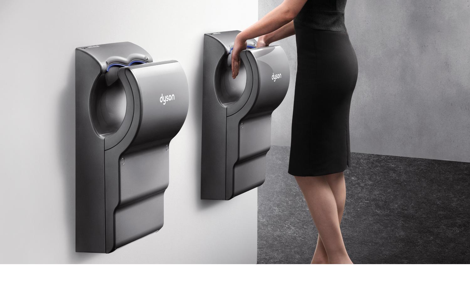 Woman using the Dyson Airblade dB