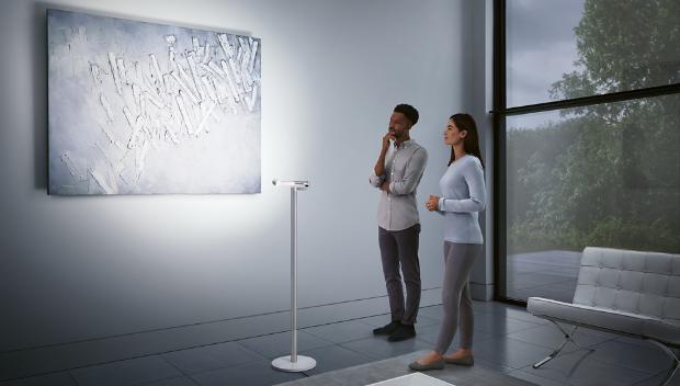 Dyson Lightcycle Morph floor light for showcasing art on a wall