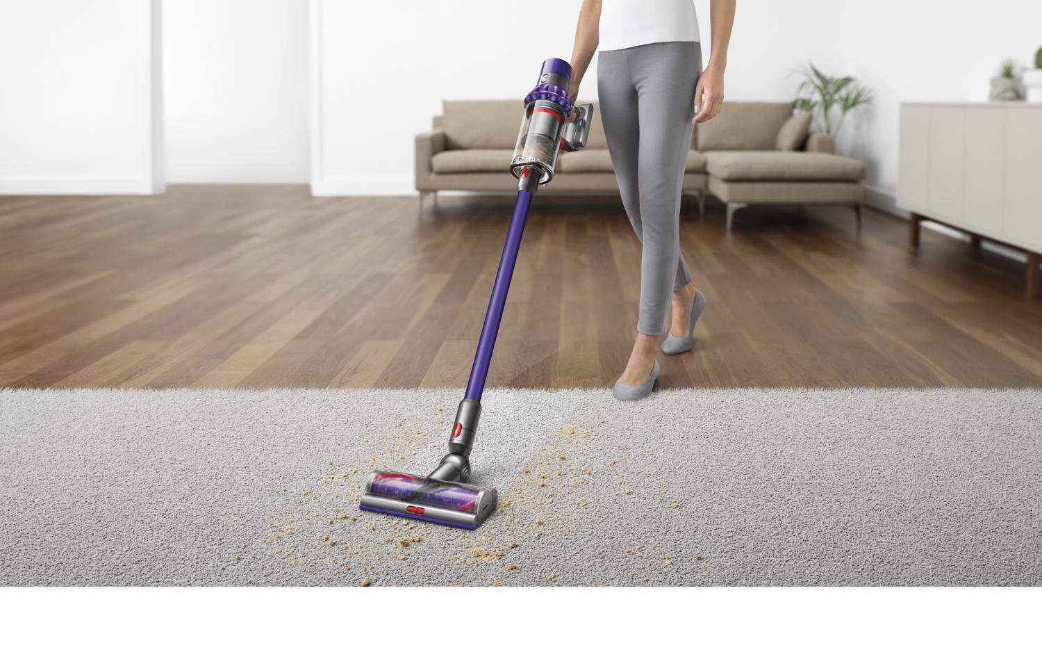 Dyson V10 vacuum cleaner lifting dirt from carpet