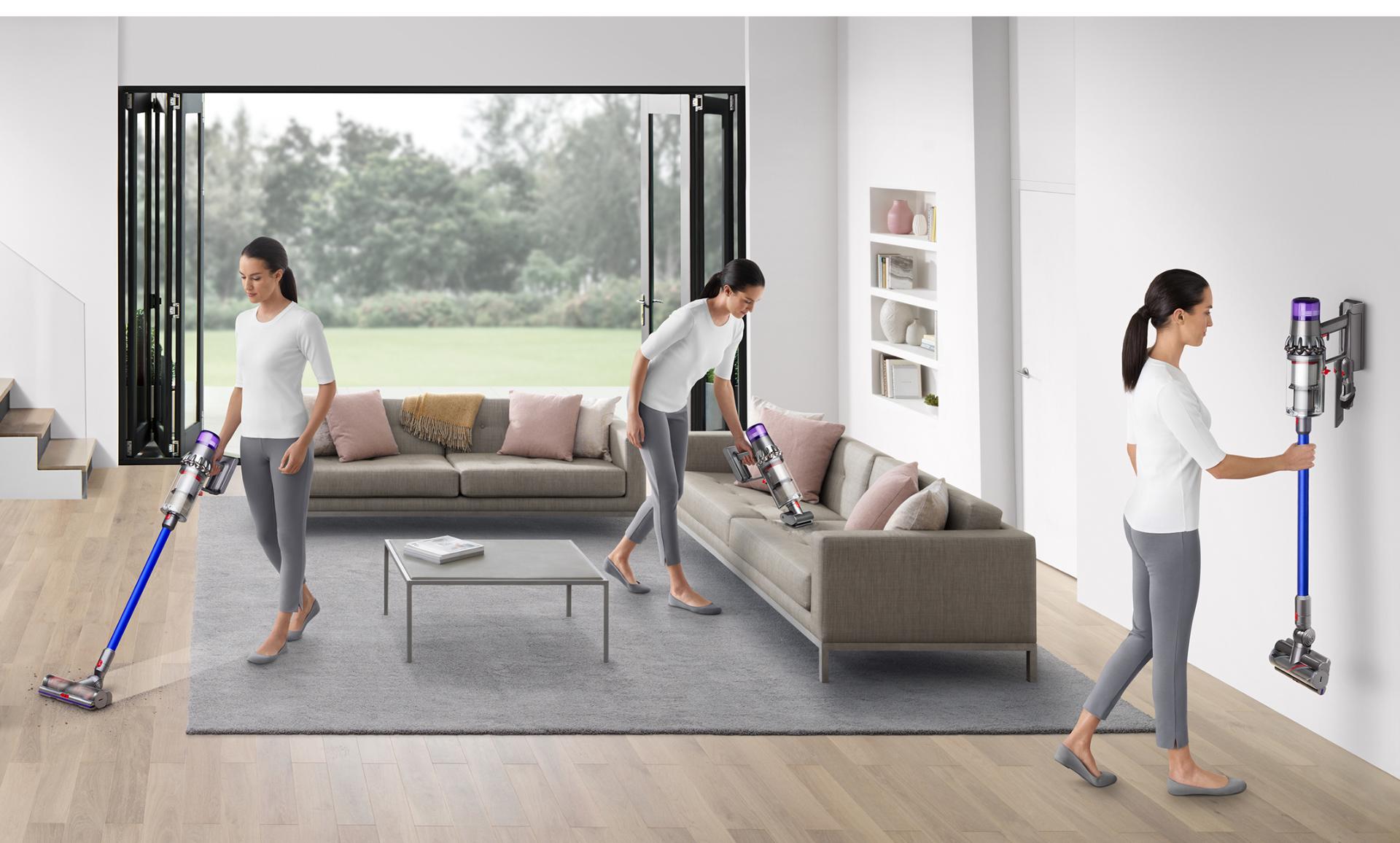 Three women using the Dyson V11 around living space