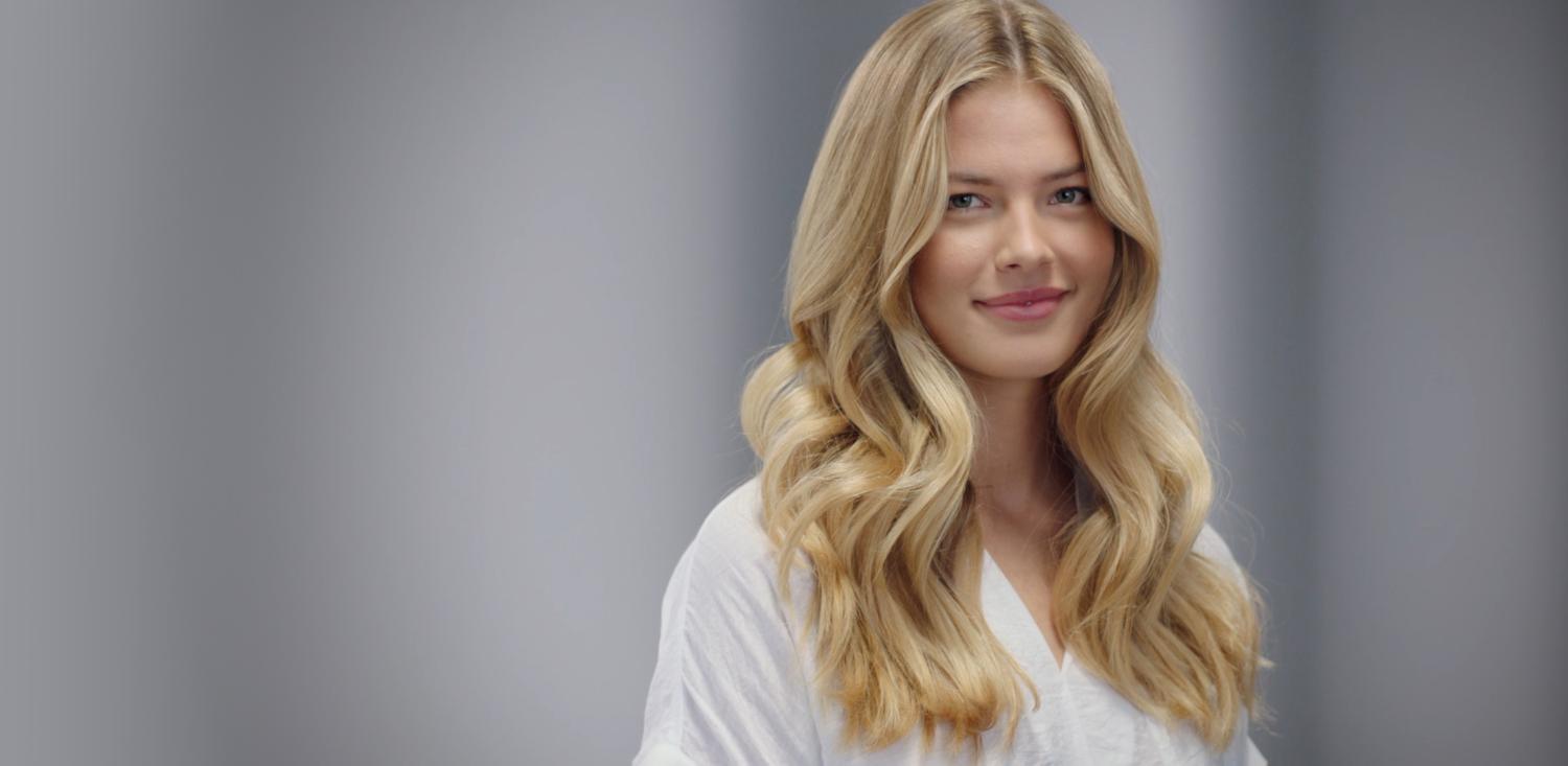 A woman with loose, natural-looking waves in her hair