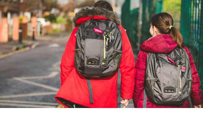 Mother and daughter walking with Dyosn technology in backpacks