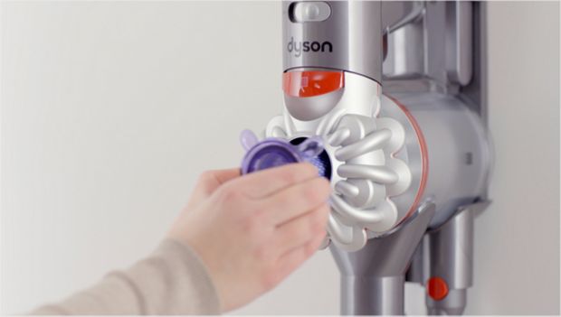 Filter A being removed from the cyclone assembly