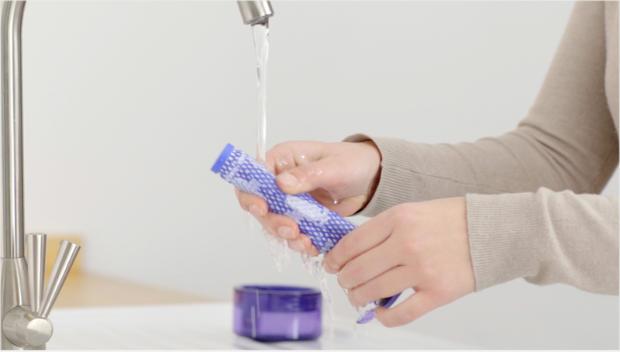 Filters A being washed under running water