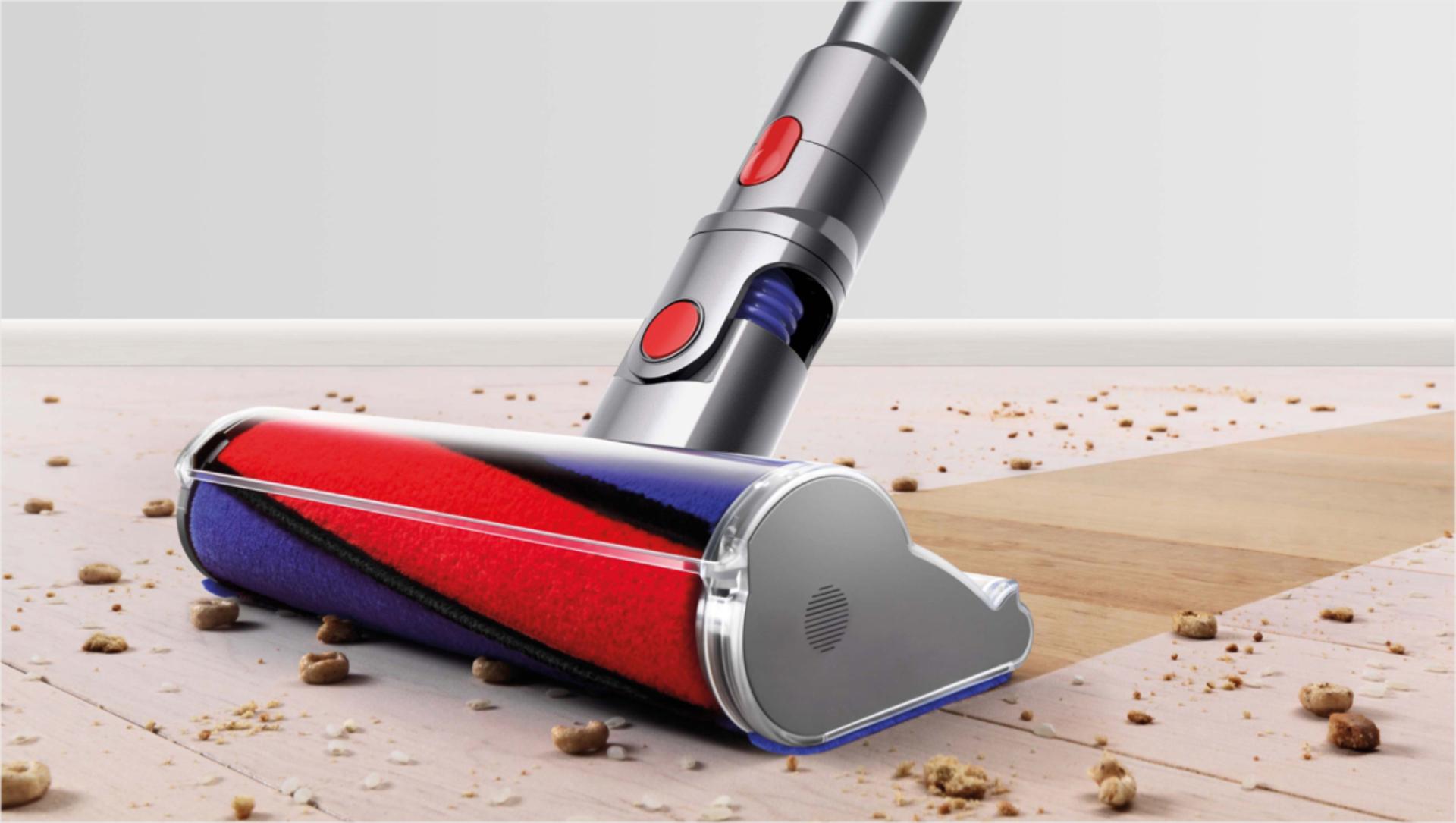 Fluffy cleaner head removing dust and debris from a hard floor