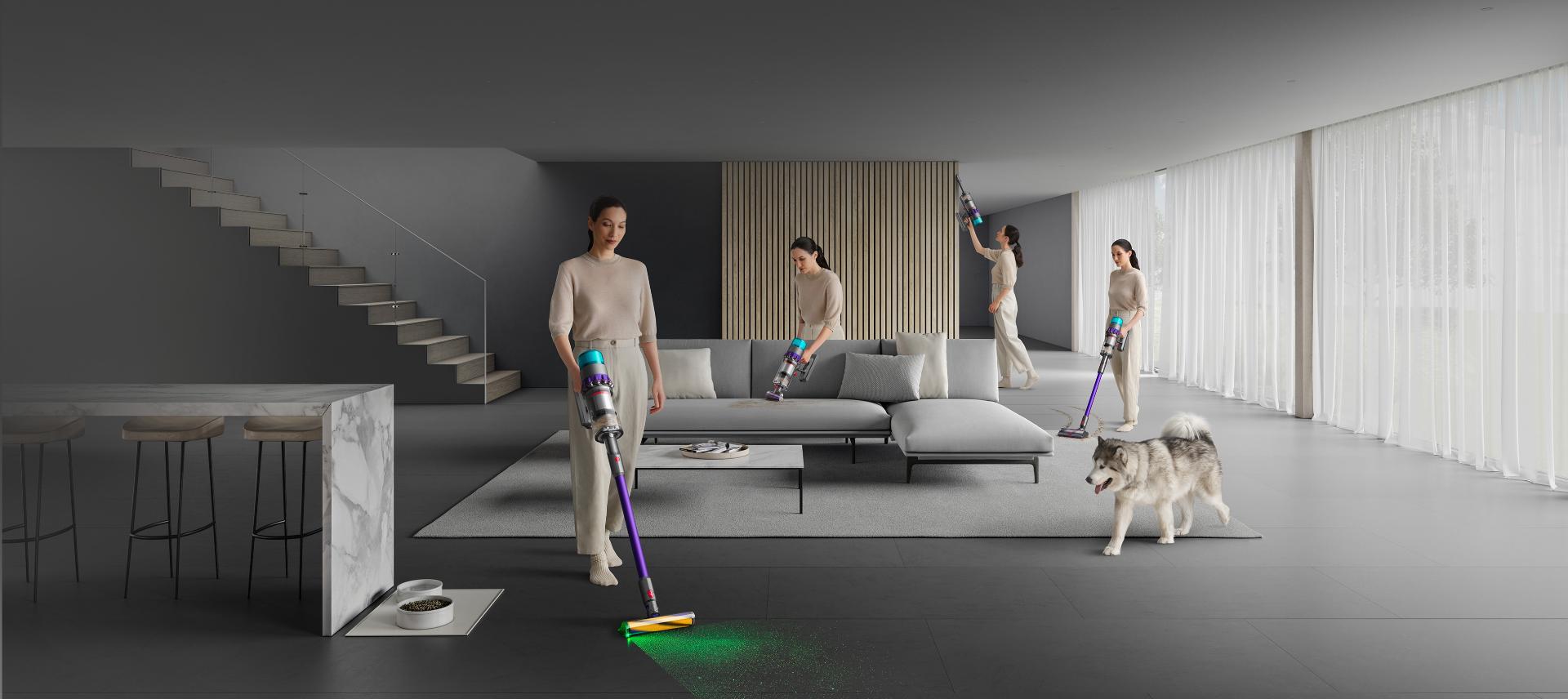 Woman demonstrating the versatility of the Dyson Gen5detect™ in various parts of a living room.