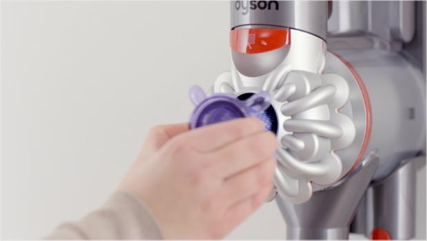 Filter A being removed from the cyclone assembly