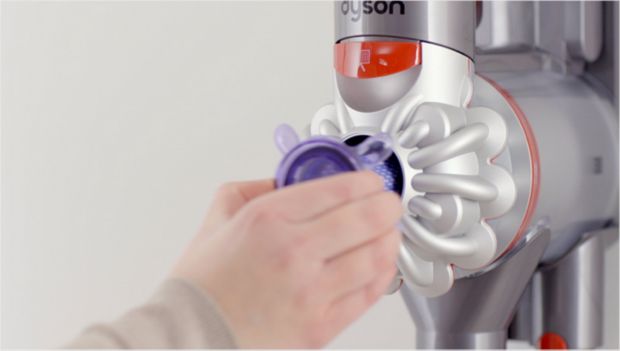 Filter A being removed from the cyclone assembly