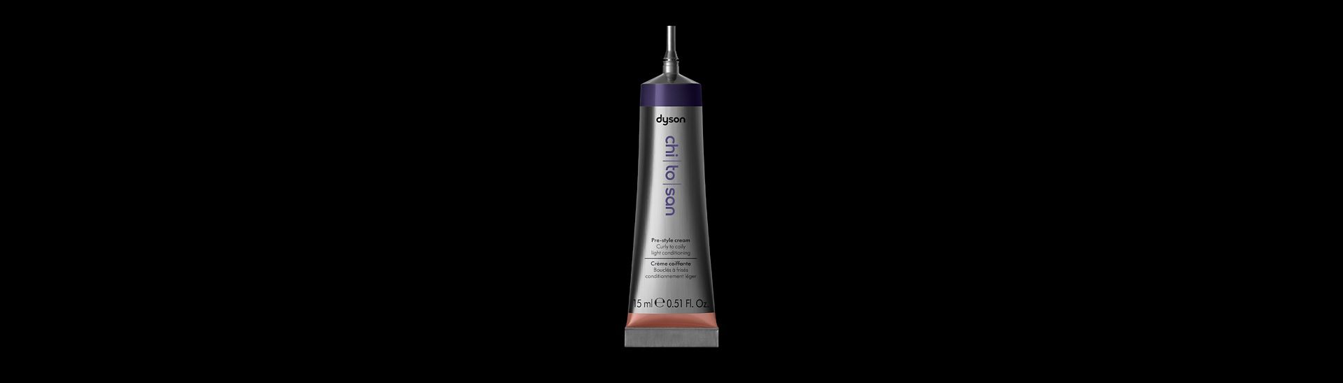 Dyson Chitosan Pre-style cream mini 15ml packshot on a dark background.