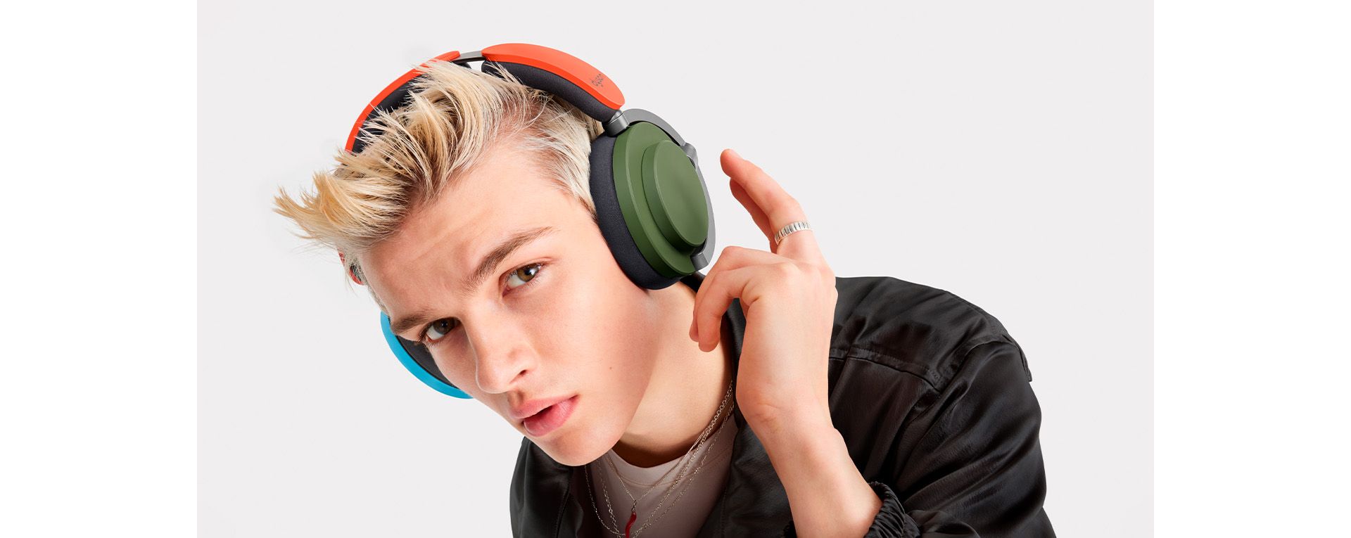 Model wearing the Dyson Ontrac headphones.