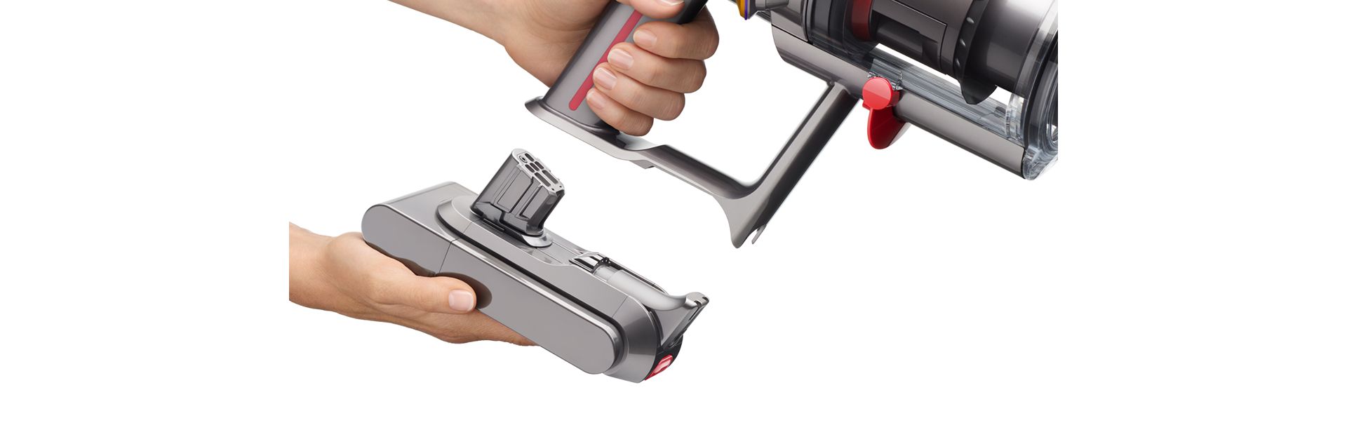 The battery is clicked into the handle of the Dyson V9 vacuum.