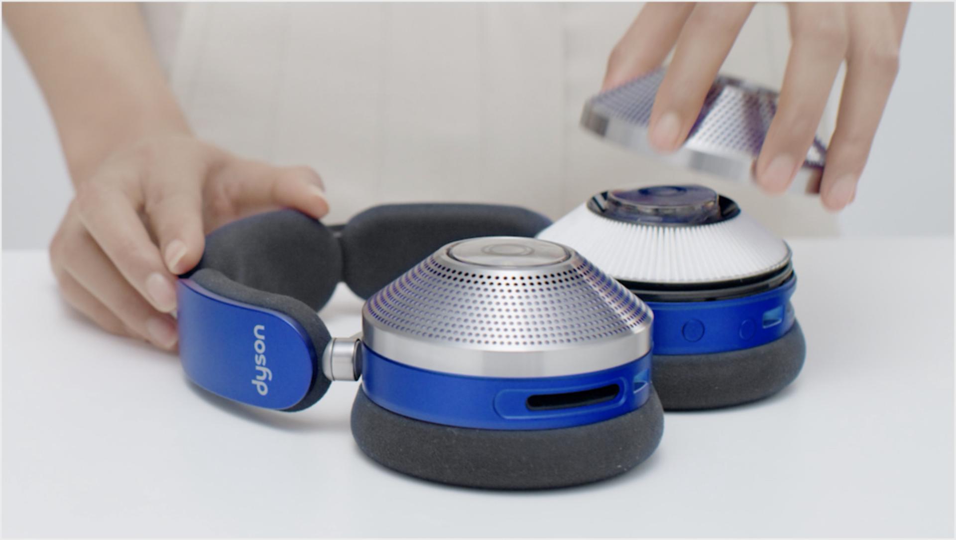 Woman shown replacing the filters in the ear cups.