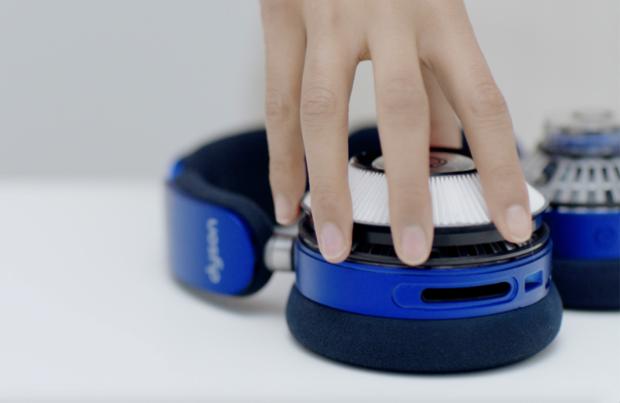 A hand picks up the filter unit.