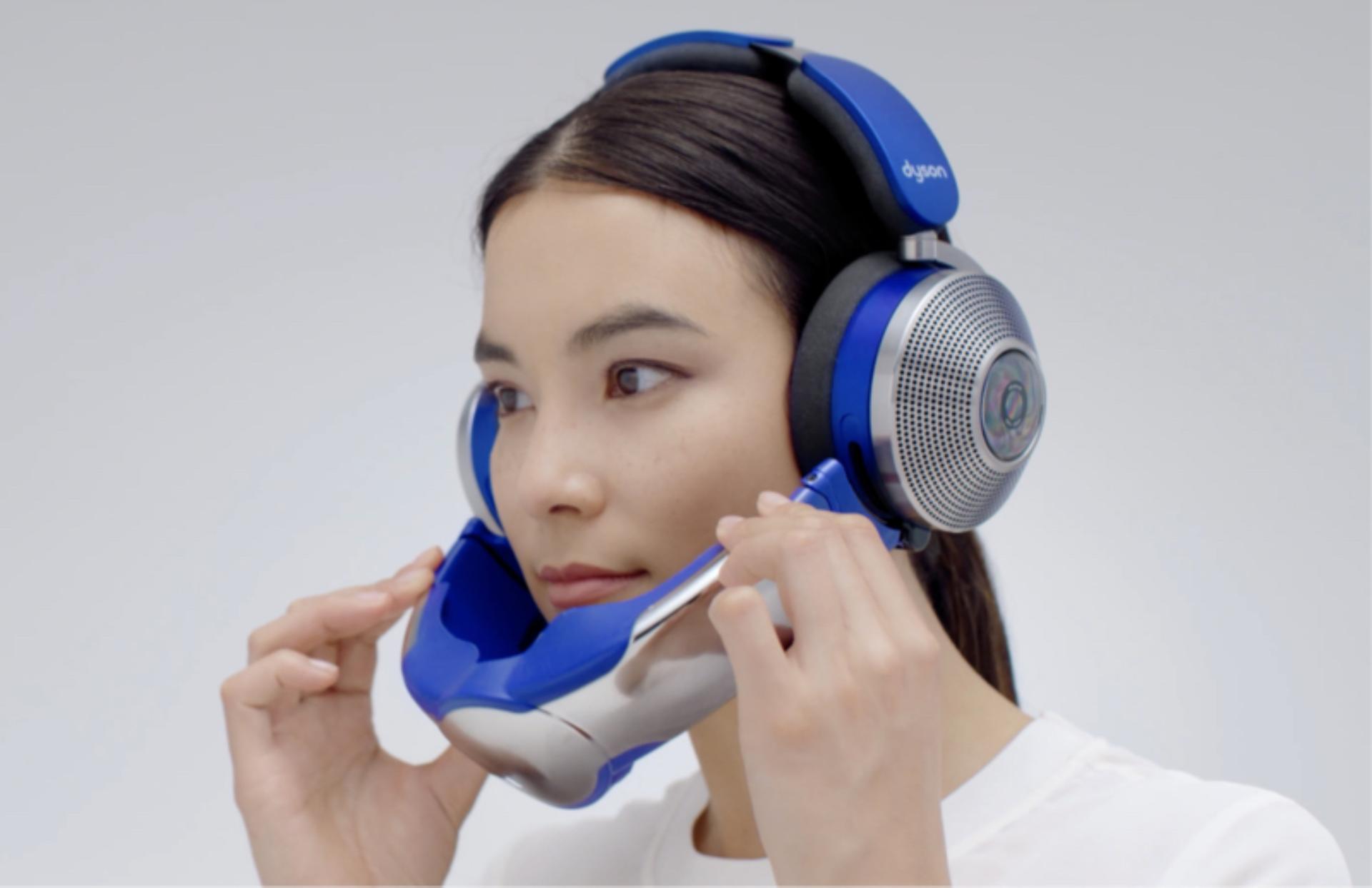 Woman attaches the visor using the magnetic connectors.