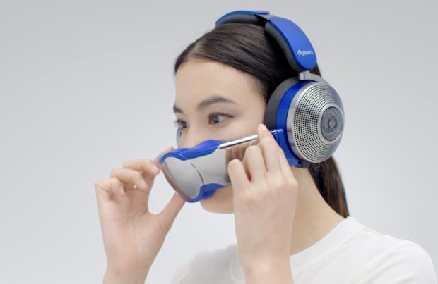 Woman raises the visor to cover her nose and mouth.