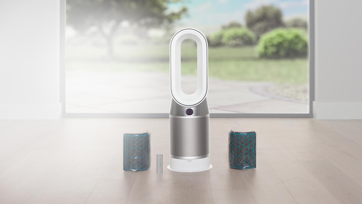 A Dyson purifier fan heater and two filters in a room