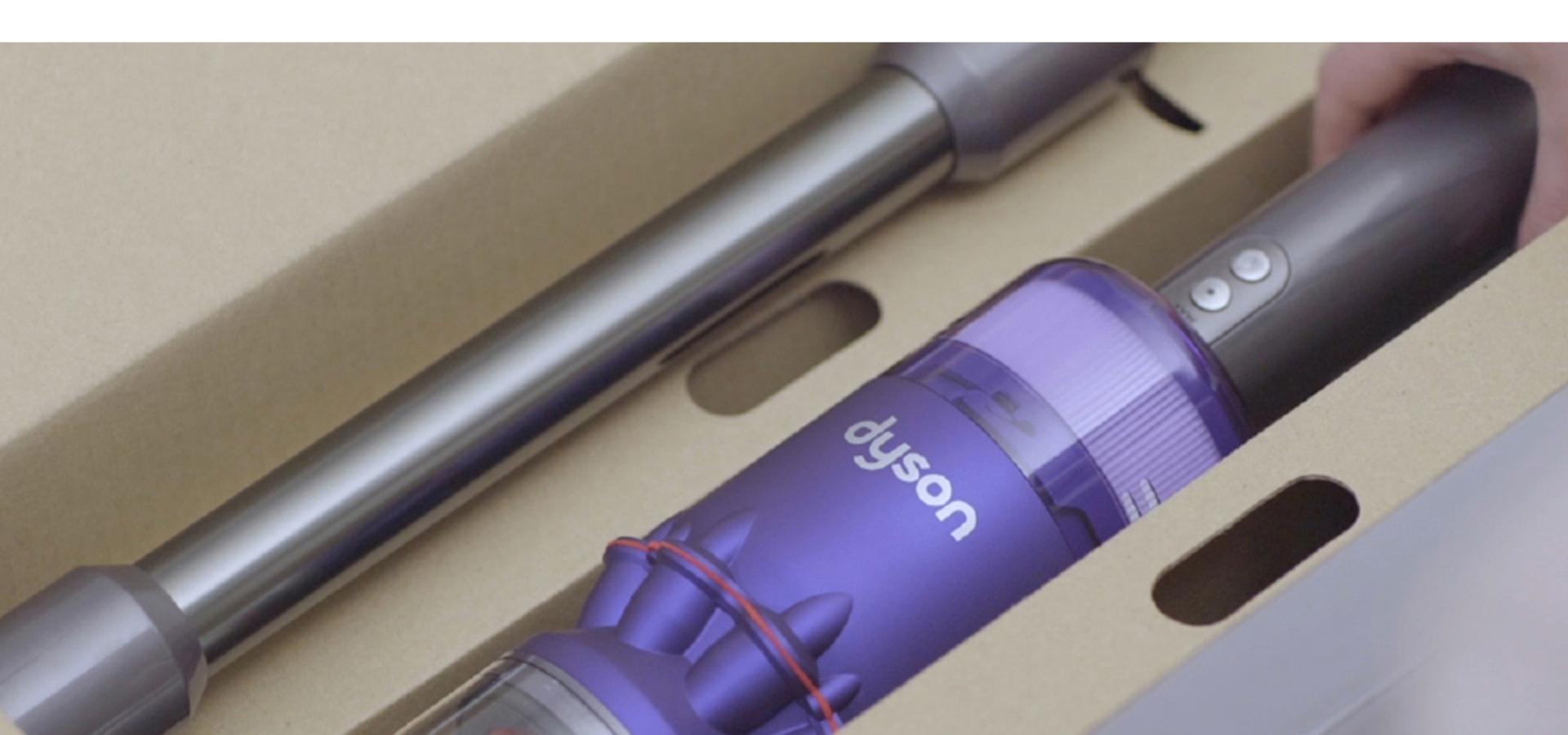 The Dyson Omni-Glide vacuum inside its box.