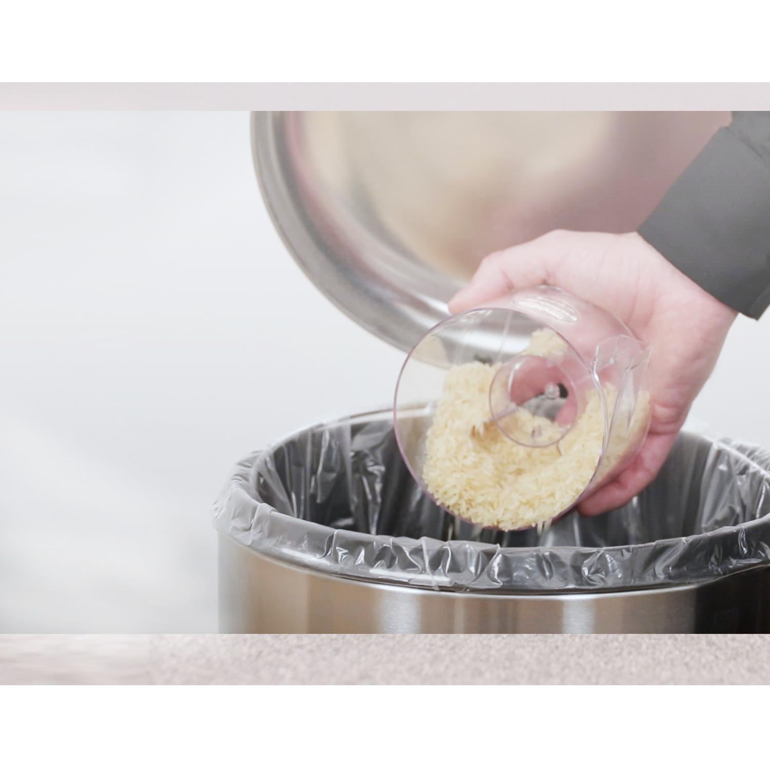 Play the video. How to empty the clear bin.