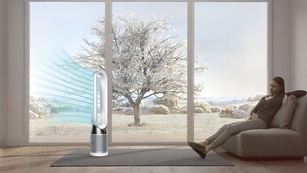 Woman being purified with the Dyson Pure Cool purifying fan