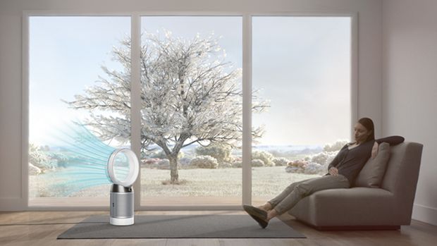 Woman relaxing in living area 