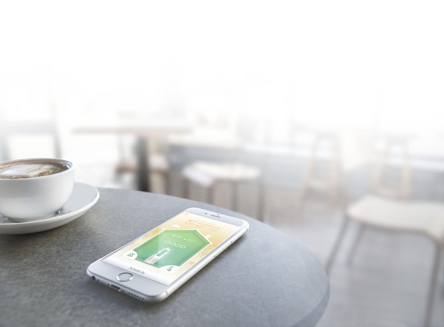 Phone with Dyson Link app on table