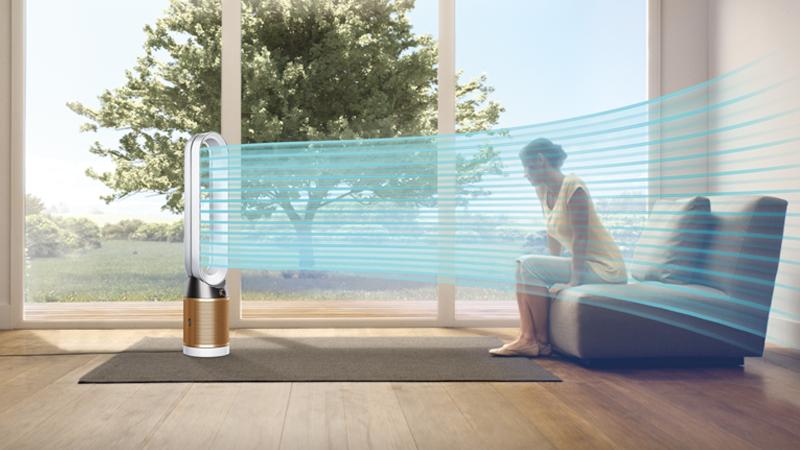 A woman relaxes in a stream of purified air in Fan mode.
