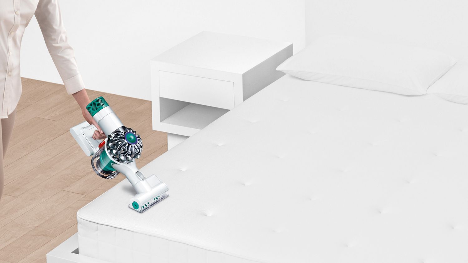  Dyson V6 Mattress vacuum on bed
