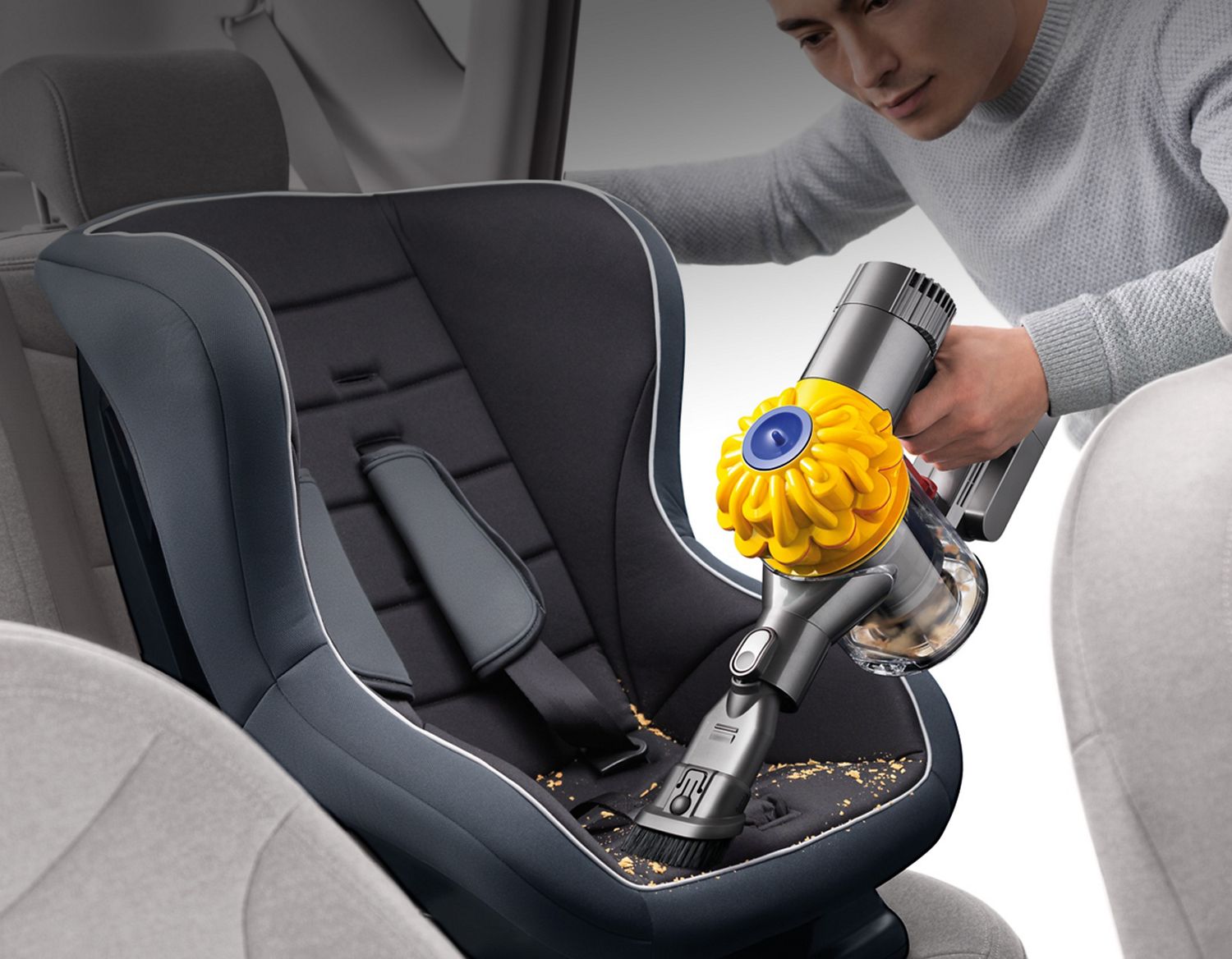 Dyson vacuum on child seat