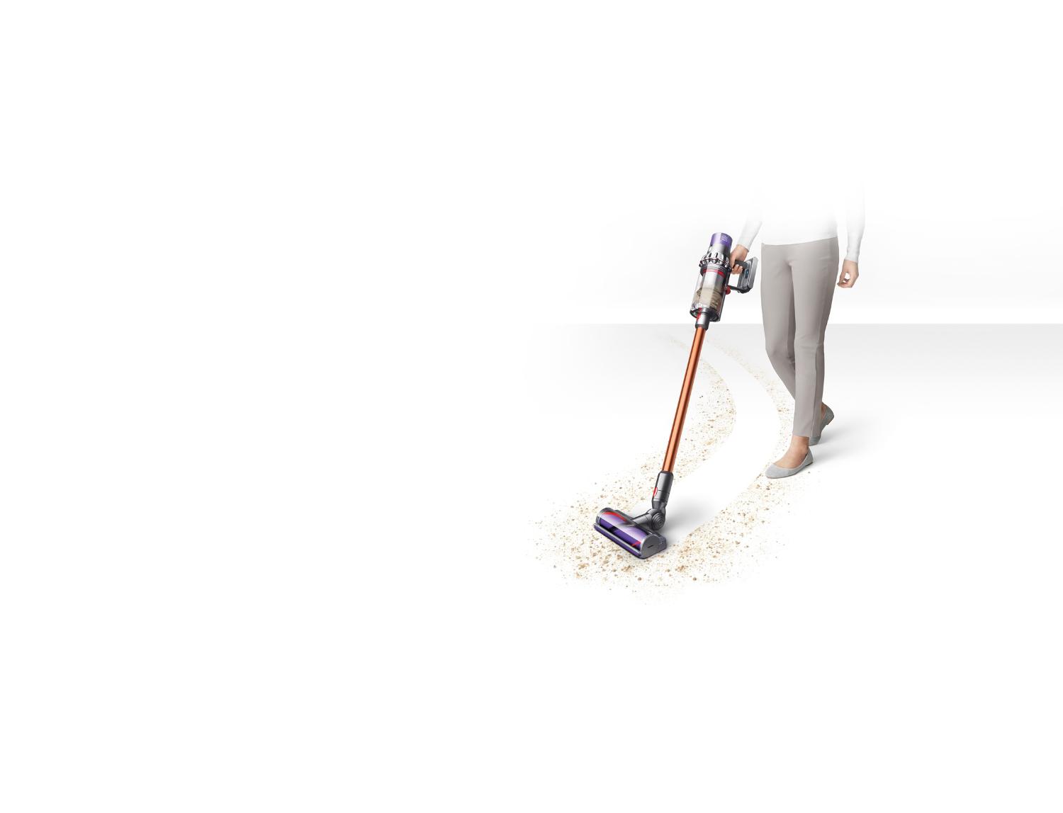 Dyson cyclone v10 being used on flooring