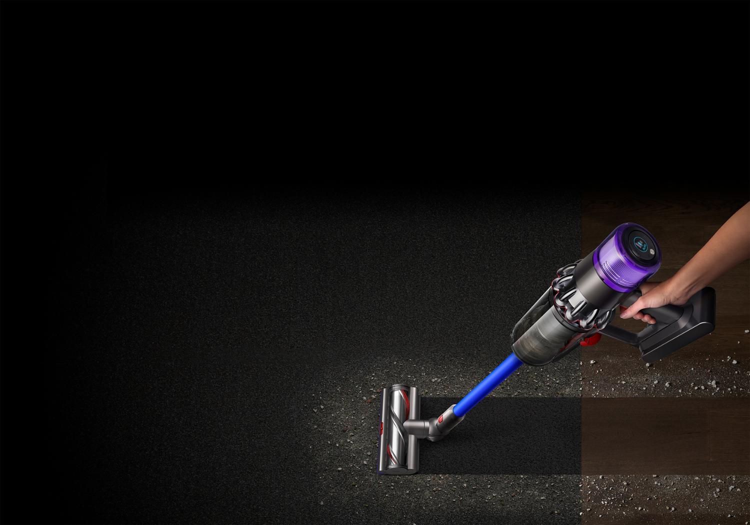 Dyson cyclone v10 being used on flooring