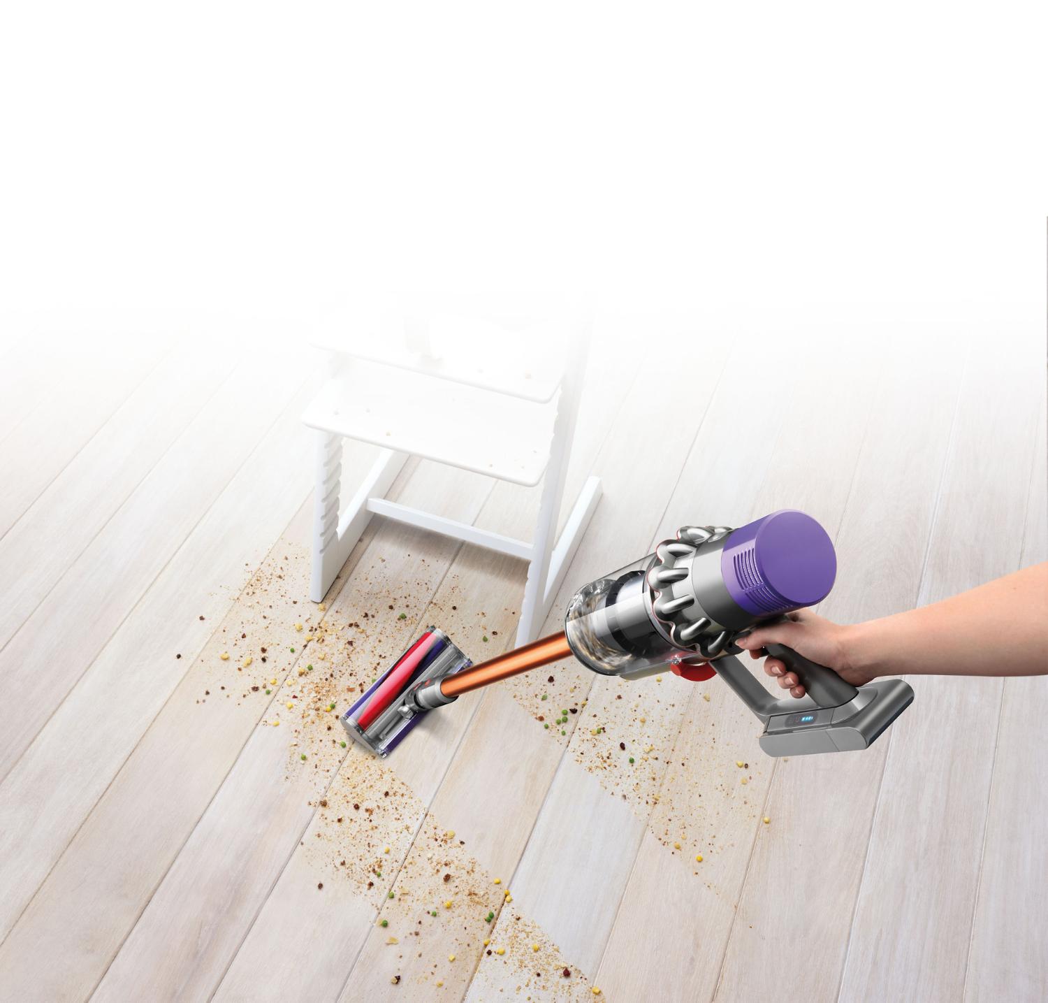 The Dyson cyclone V10 cord free vacuum cleaner picking up debris from the floor