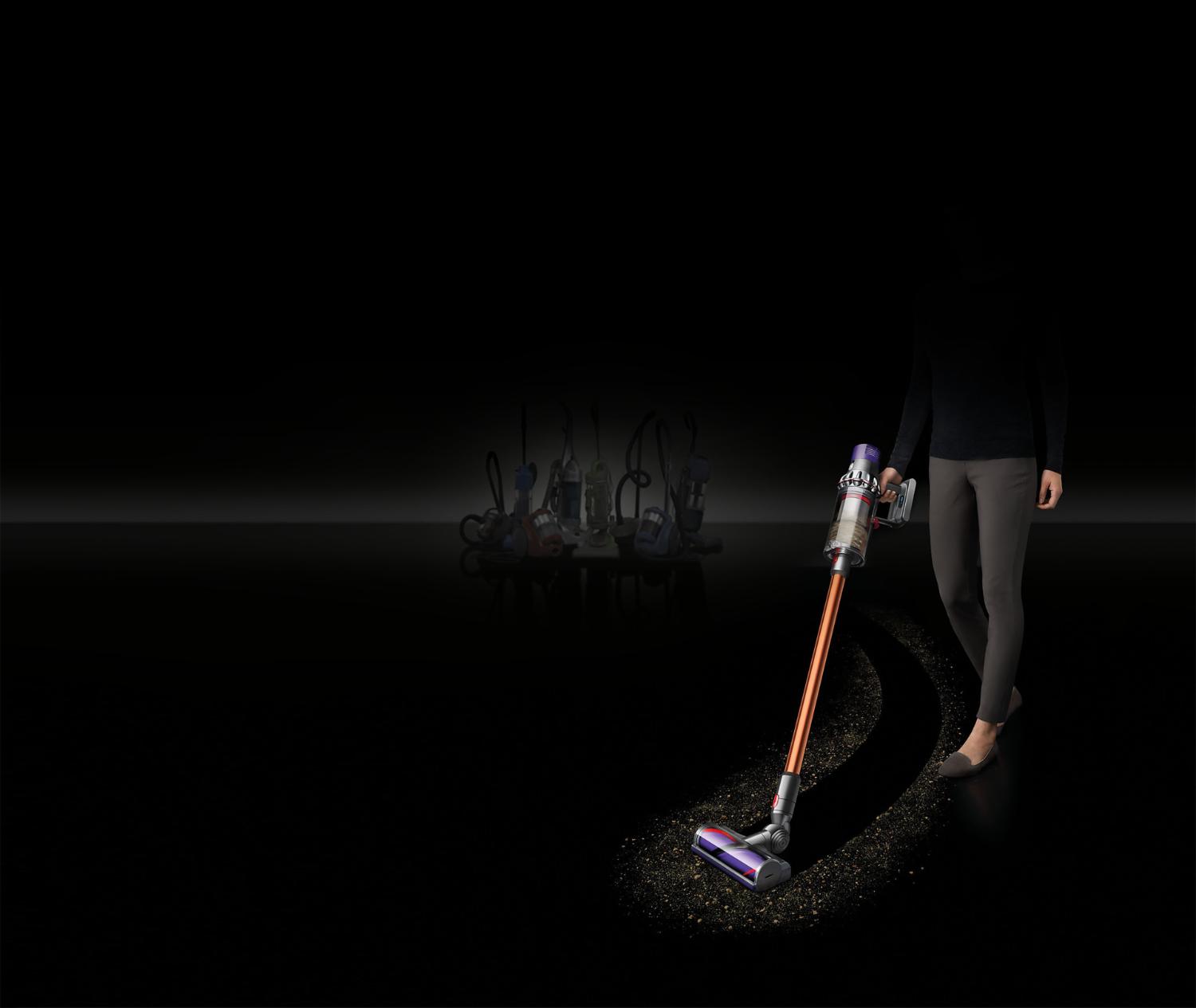 Dyson Cyclone V10™ vacuum cleaner on black floor