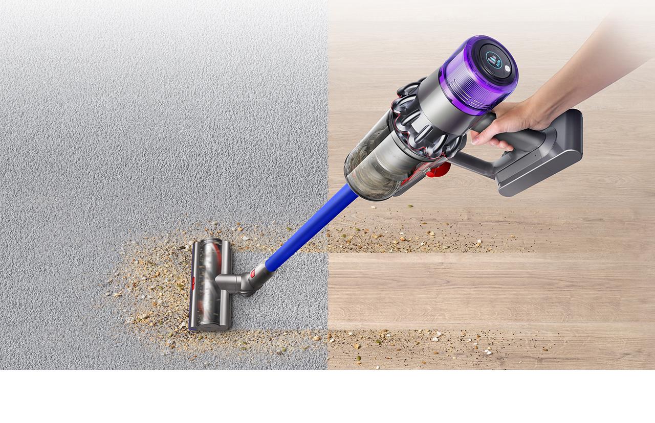 Dyson V11 motorhead picking up debris across multiple surfaces