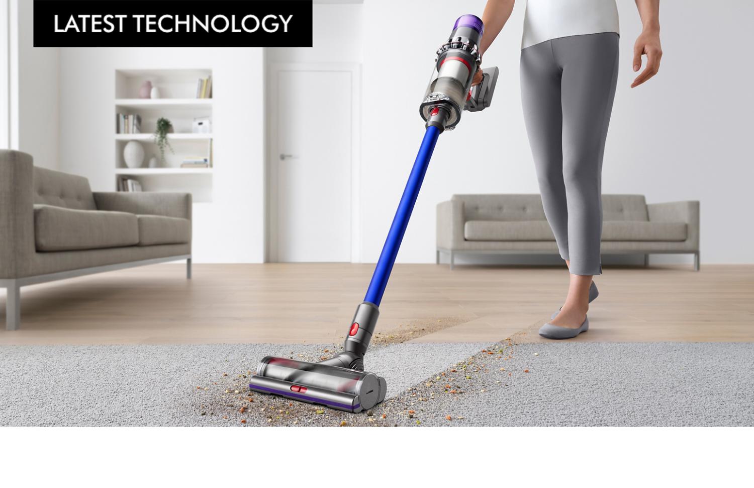 Dyson V11 vacuum cleaner vacuuming carpet and hardfloor