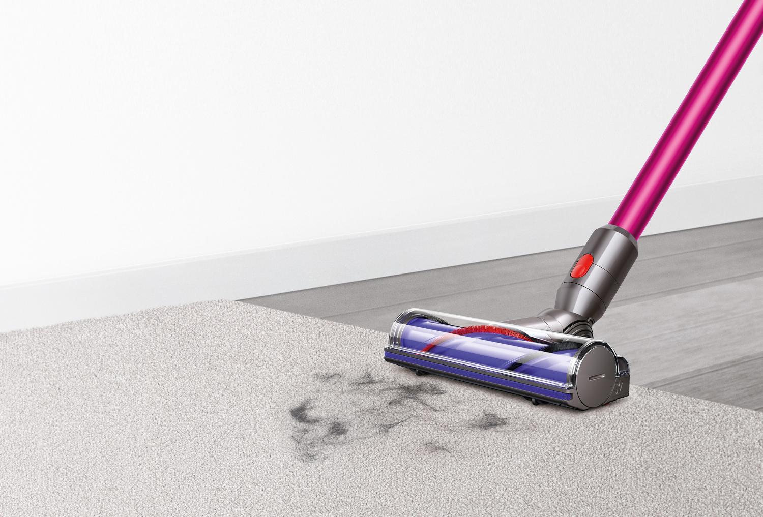 Dyson V7™ vacuums on carpet