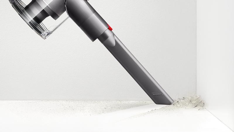 Dyson V7 HEPA vacuum cleaner crevice tool in corner