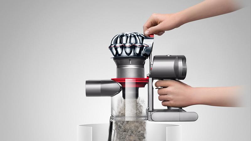 Dyson V7 HEPA vacuum cleaner emptying the bin