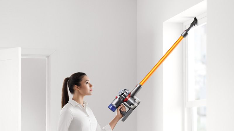 Model with Dyson V8 Absolute vacuum