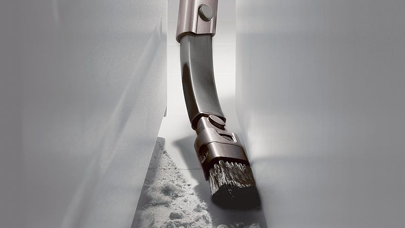 Flexi crevice tool between furniture